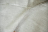 A sturdy seam connecting two panels of the plain-weave hemp kilim.