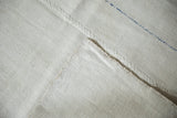 Detail of the seamed construction on the back of a vintage plain-weave hemp kilim.