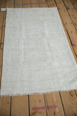 Hand-woven Turkish Hemp Kilim with plain-weave texture and subtle platinum and ivory tones.