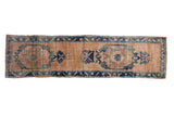 Distressed Oushak runner, faded sand field, double offset blue medallions, foundation showing, 1'10