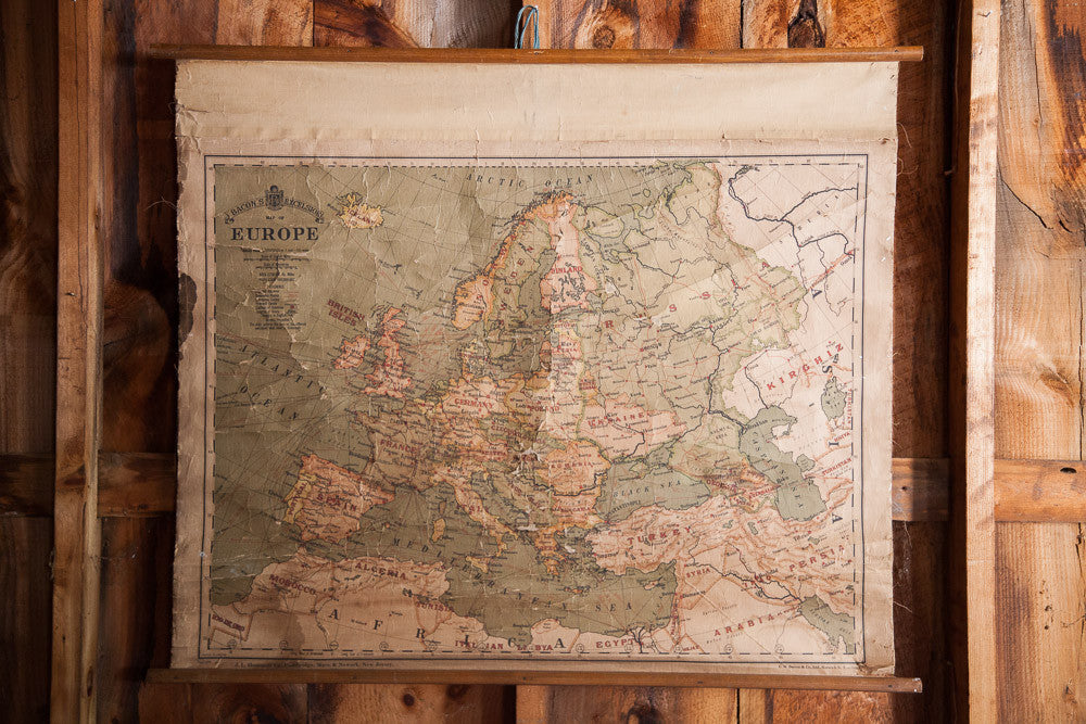 Early 20th century pull-down Europe canvas map, muted greens and browns, rustic texture, 41x34.