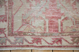 Vintage distressed Oushak runner's blush, beige, slate geometric pattern, showing knot heads and short fringe.