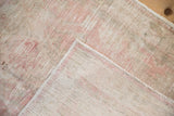 Reverse view of a vintage Oushak rug, showing the clean hand-knotted foundation.