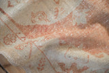 Detail of the distressed low pile on a vintage Oushak rug, showing wear across the knot heads.
