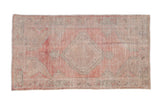 Vintage Distressed Oushak rug, faded raspberry red with ivory diamond medallion, 2'5