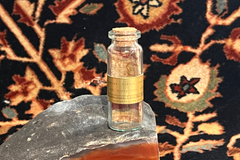 Medium Antique Silk Rug Fragment in a Bottle Souvenir