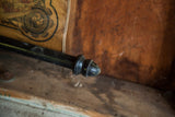 Turned finial detail on the black wooden dowel of a pre-Civil War map.