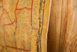 Aged canvas edge and decorative border detail on a mid-19th century New York map.