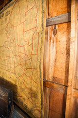 Side view of the antique New York map's canvas, showing its aged patina and illustrated border.