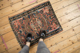 Overhead view of an antique Persian Lilihan mat showing its real-life scale.