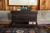 Antique dark wooden chest with three drawers, liftable top, brass pulls, circa 1890.