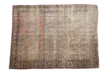 Antique Kerman rug, repeating cochineal red botehs and intricate scrolling jade green leaves, storied wear, 4'2