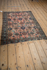 Antique Persian Mehriban rug, dusty rose field with sapphire palmettes and Herati motif, wear across knot heads.