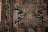 Antique Mehriban rug detail, worn pile revealing foundation, with dusty plum and blue vinery.