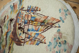 Hand-knotted pile texture of the vintage Art Deco rug, with ivory, blue, and gold ship motif.