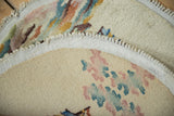 Hand-knotted Art Deco rug, showing tight weave, secured edge, and textured pile.