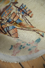 Vintage Art Deco rug pile, ivory ground, colorful abstract pictorial motifs, and fringed edge.