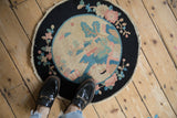Antique Chinese Art Deco rug with pictorial landscape and floral motifs in navy, ivory, dusty rose.