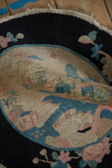 Textured hand-knotted pile of the Art Deco pictorial rug, dusty rose, sky blue.