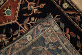 Corner view of the antique rug's secured side cord selvage and hand-knotted foundation.