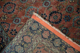 Antique Bibikabad rug's sewn backing, intricate floral border, original selvage, and fringe.