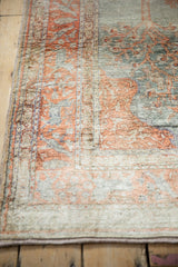 Soft, lustrous pile texture of the vintage Kaisary rug with rust and silver border.