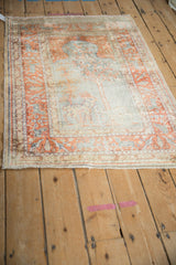 Kaisary rug with a pictorial deer and tree of life in silver and rust tones.