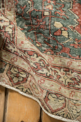 Textured low pile with visible knot heads on a vintage distressed Sparta rug.
