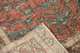 The woven foundation and machine-bound edge of a hand-knotted vintage Sparta rug.