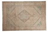 Vintage distressed Turkish Tabriz carpet, diamond medallion and beige, dusty turquoise, rose Herati field.