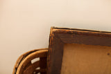 Mitered corner and aged wood on the back of the antique painting's reclaimed frame.