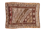 Distressed Kars square rug with geometric pattern, checkered borders, aubergine, ivory, saffron.
