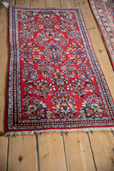 Hand-knotted Sarouk runner fringe and detail of pearl seed border motif.