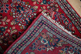 Tight hand-knotted pearl seed border on the reverse of the Vintage Sarouk rug.