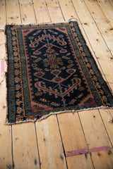 Antique Mehriban rug detail: dark blue field, Laleh Abbasi border, and areas of wear.