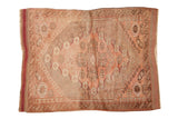 Vintage Anatolian square rug, central medallion, dusty rose and greige geometric patterns.