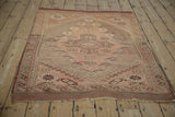 Vintage Anatolian rug corner, running T border, serrated palmettes in dusty rose and brown.