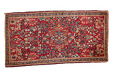 Vintage American Sarouk rug runner with all-over floral sprays in cherry red and sapphire blue.