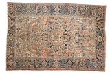 Vintage Distressed Heriz carpet with trefoil medallion, dusty rose field, navy border, 7'4