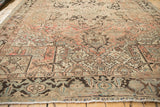 Distressed Heriz carpet with geometric starburst and curvilinear patterns, Turtle Samovar border.