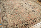 Distressed vintage Heriz rug border, geometric Turtle Samovar motif, dusty rose and brown.