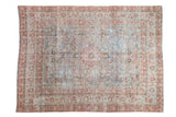 Vintage distressed Persian Meshed rug, faded powder blue field, roundel medallion, rosy floral borders.