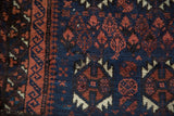 Minor moth etching to the knot heads and short pile of an antique Persian Belouch rug mat.