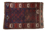 Antique Belouch rug with a red and cobalt blue lattice of ram's horn motifs and a pictorial panel border.