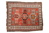 Vintage Caucasian rug, triple medallion Avar design, red, ivory, dark brown colors.