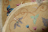 The back of an antique Art Deco rug, revealing the hand-knotted construction and weave.