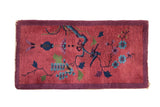 Antique Art Deco pictorial runner with bird and branch design; cochineal red, sapphire blue, aubergine.