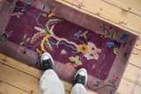 Antique Chinese Art Deco runner, elaborate plant design in aubergine, mauve, celadon, and gold.