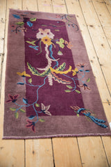 Intricate pictorial plant design in aubergine, celadon, gold on an Antique Art Deco runner.