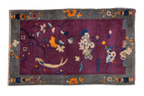 Antique Chinese Art Deco hand-knotted rug, deep violet pictorial field of birds and lotus flowers.